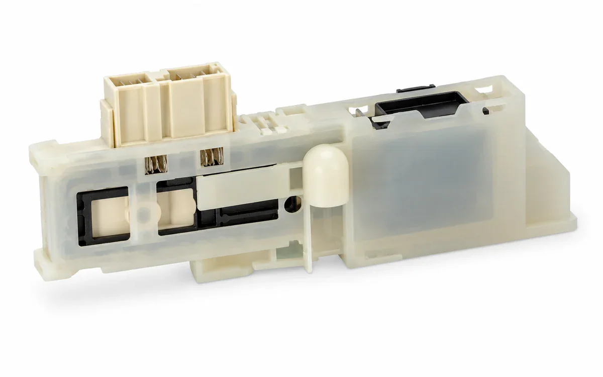 Blocapuertas para Drean Gold y Candy CTS41/61 de plástico claro con conector eléctrico sobre fondo blanco